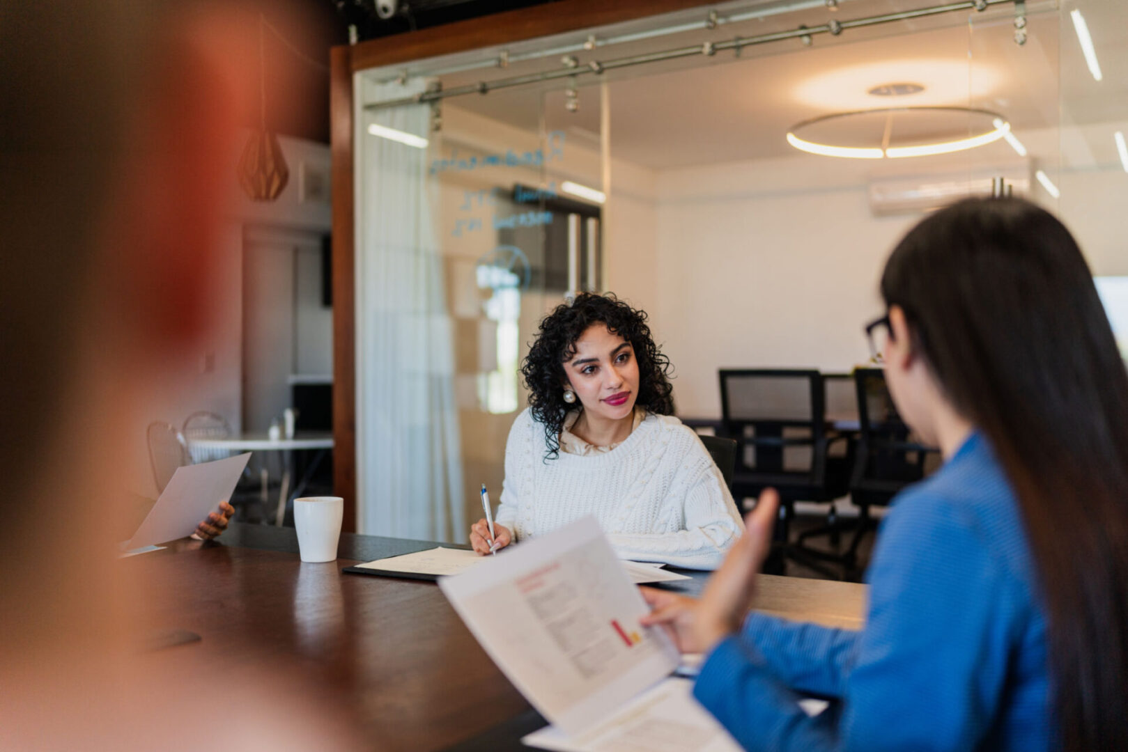Office team engaged in conversation